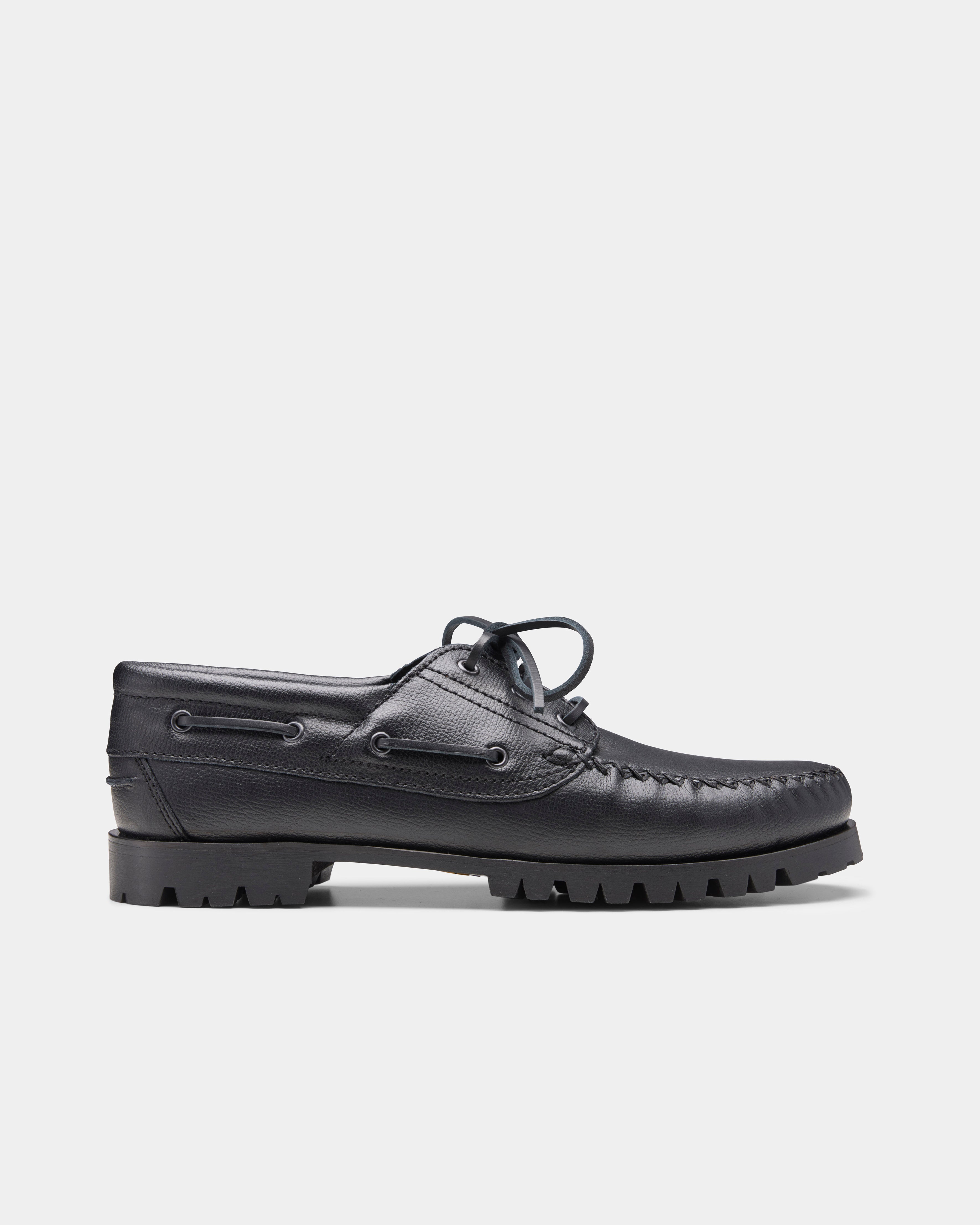 aztec boat shoe in black from the side