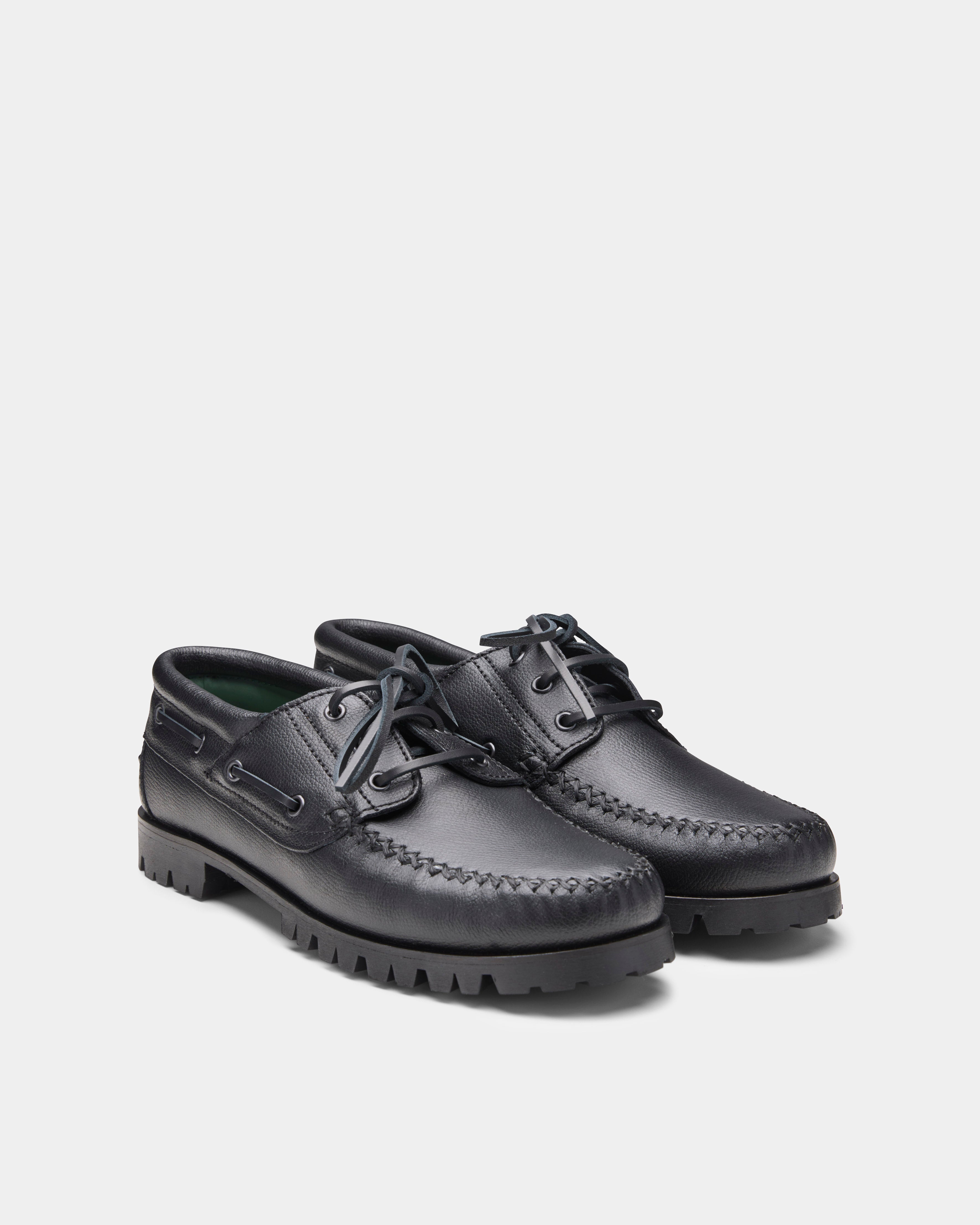 aztec boat shoe in black from the front