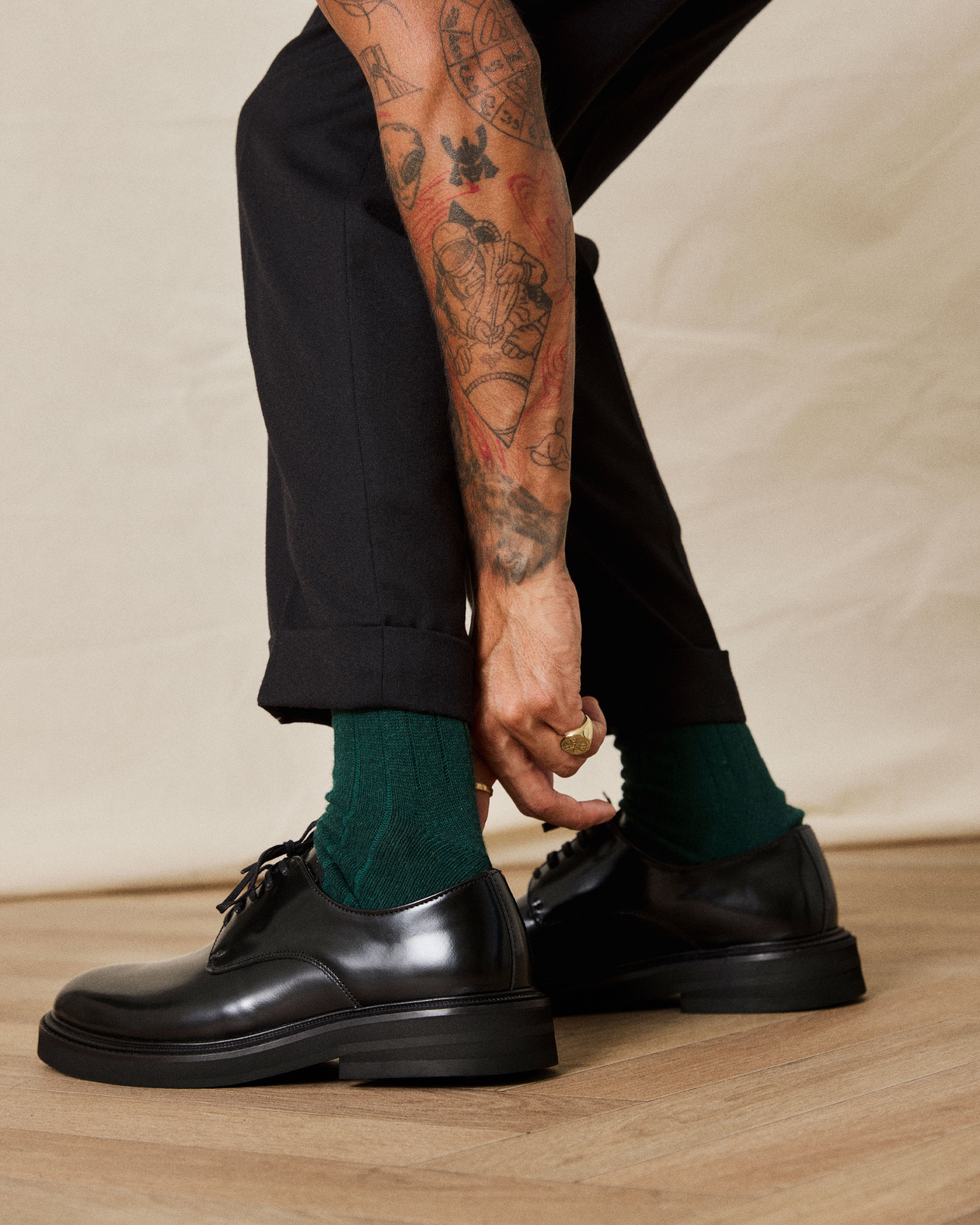 Officer derbee in black on model