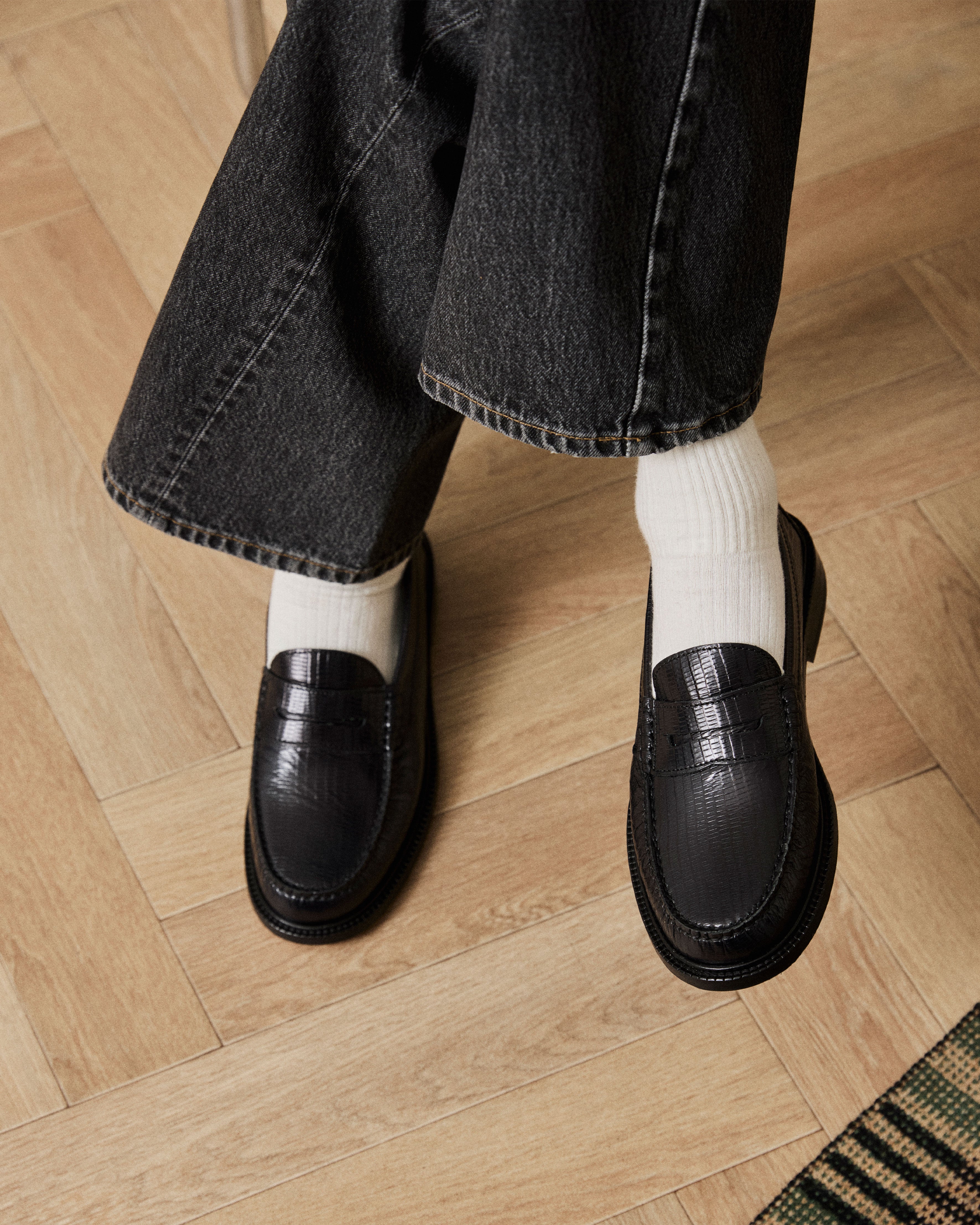 yardee in black lizard on model