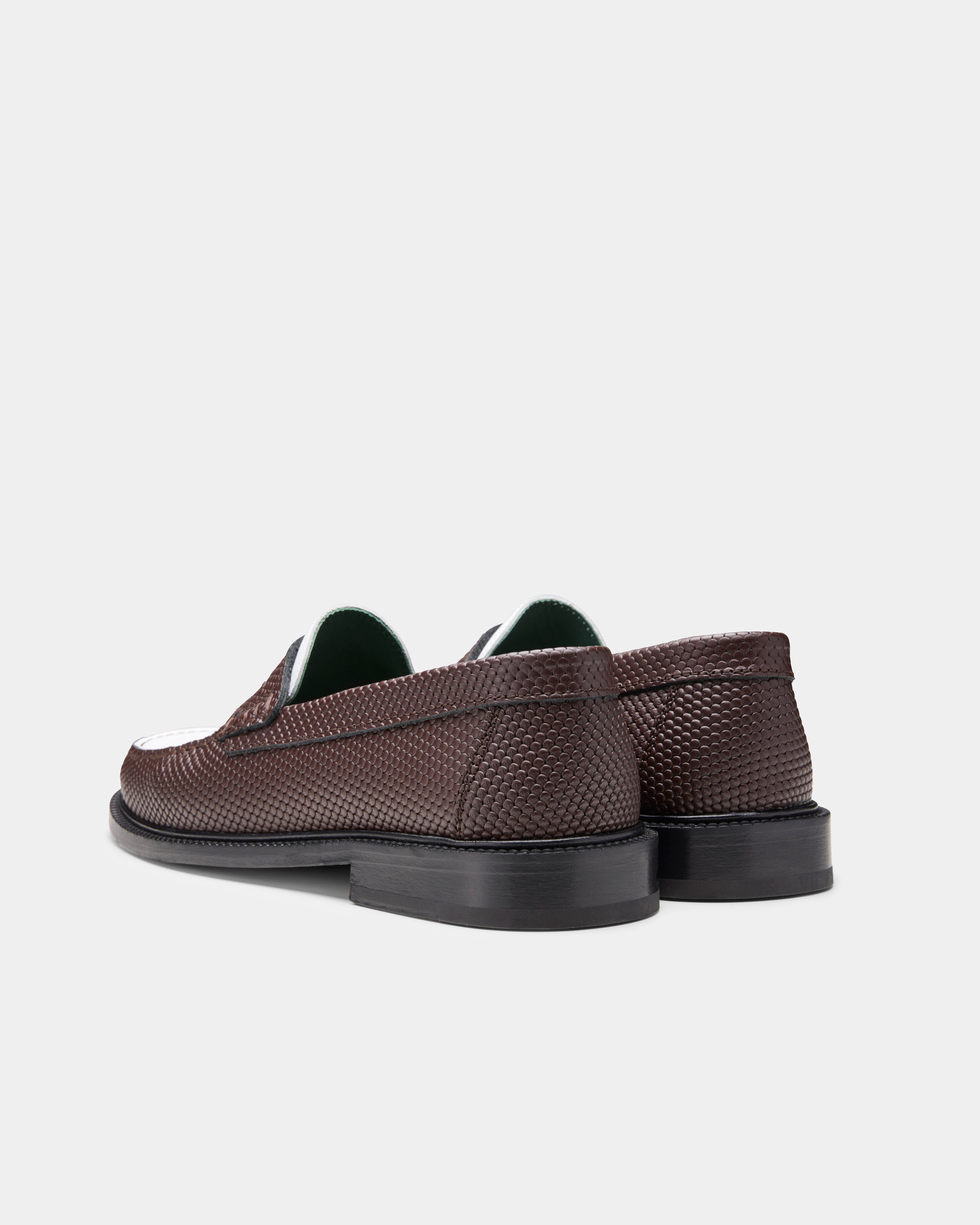 yardee moccasin loafer in brown and white from the back