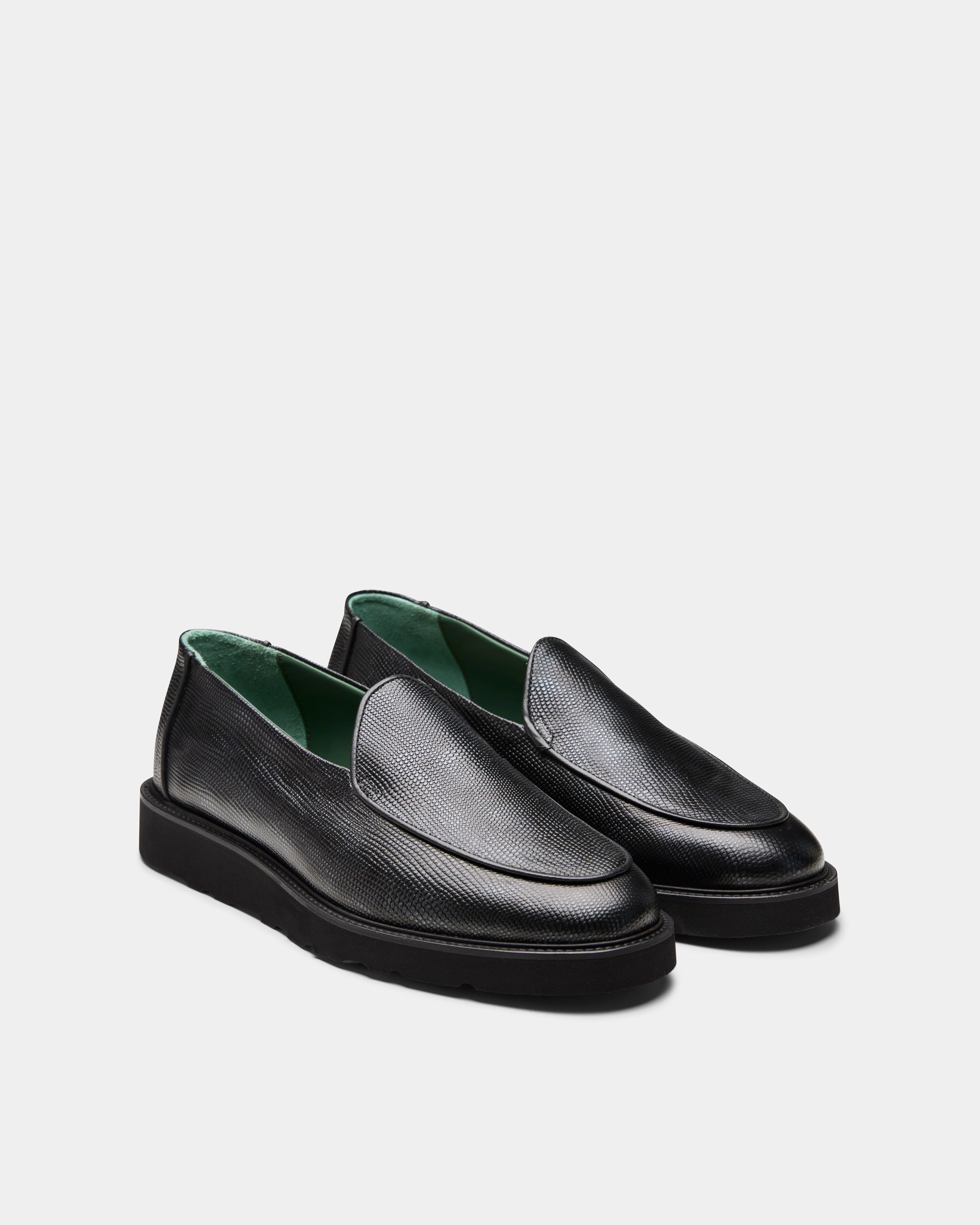 belgee loafer in black from the side front