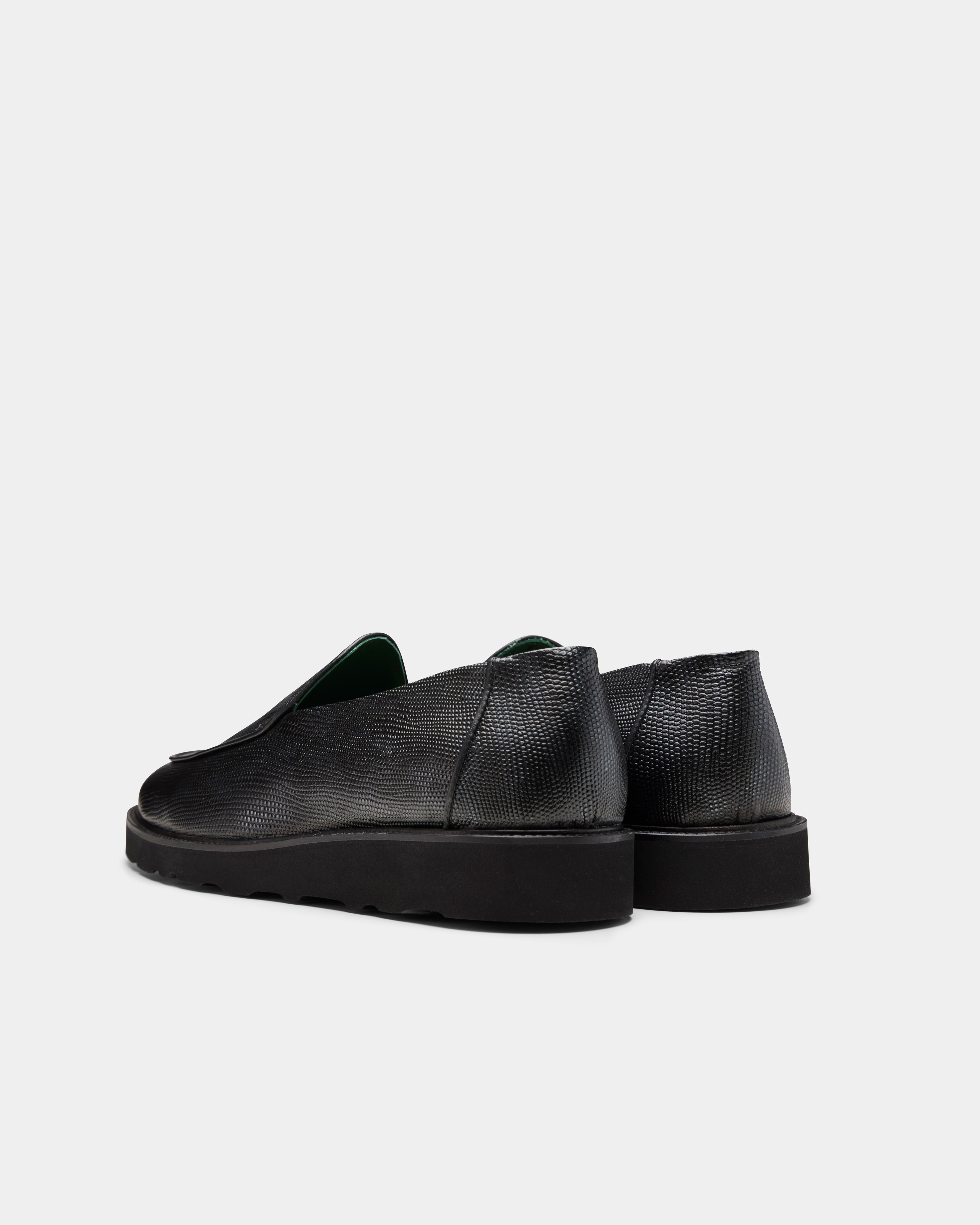 belgee loafer in black from the back