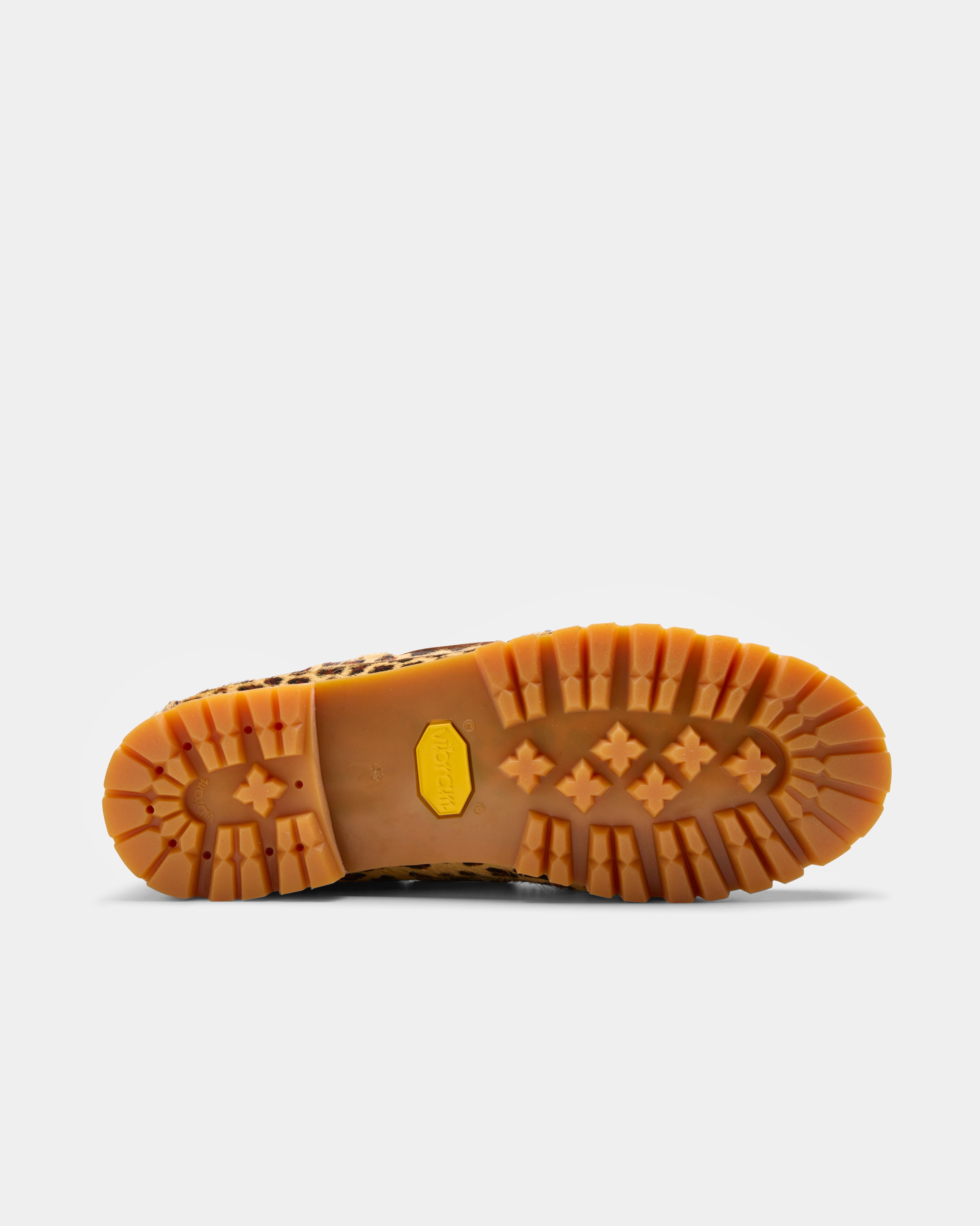 Aztec shoe with leo print from under the sole