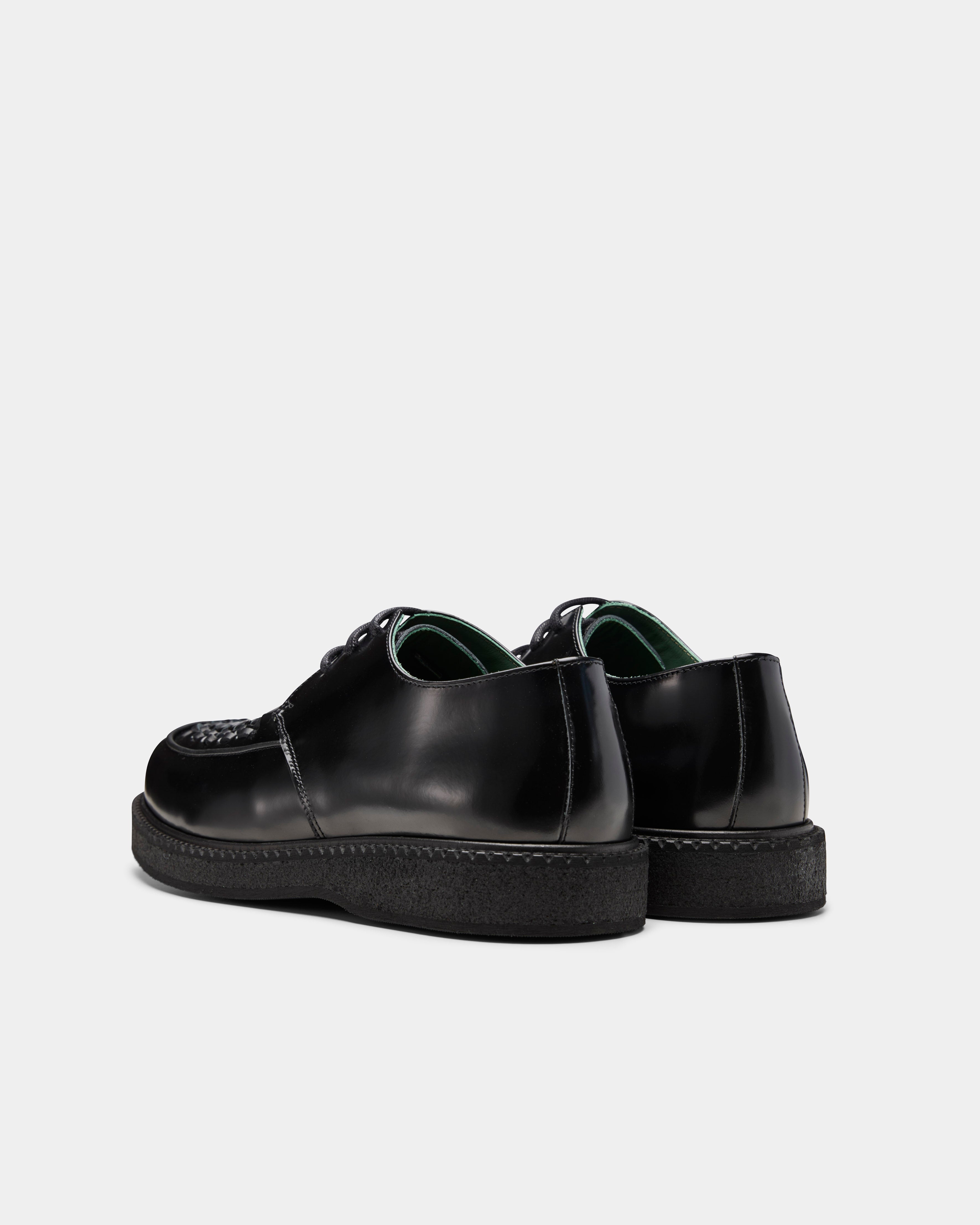 boat creeper in black from the back