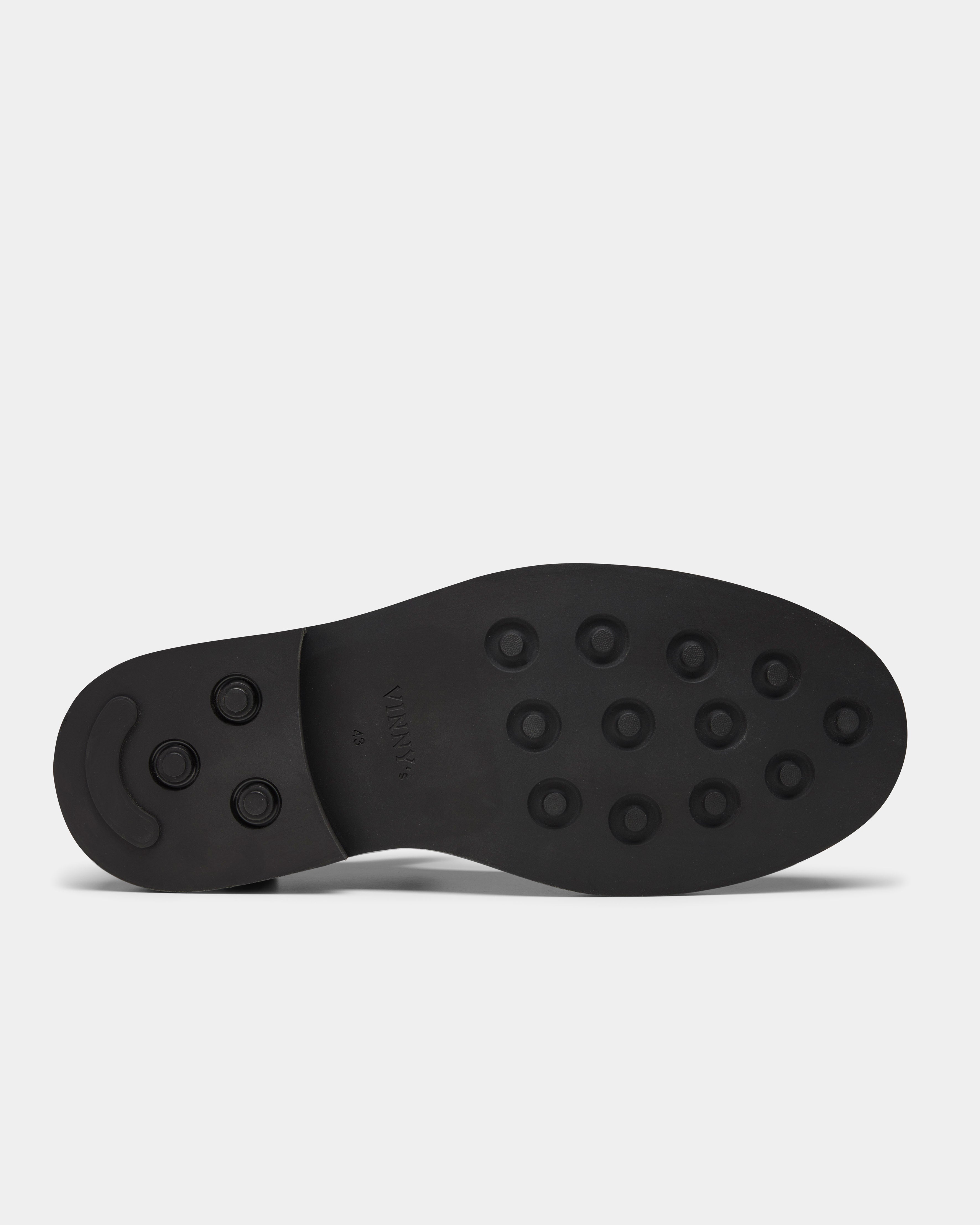 Maree in black lizard under the sole