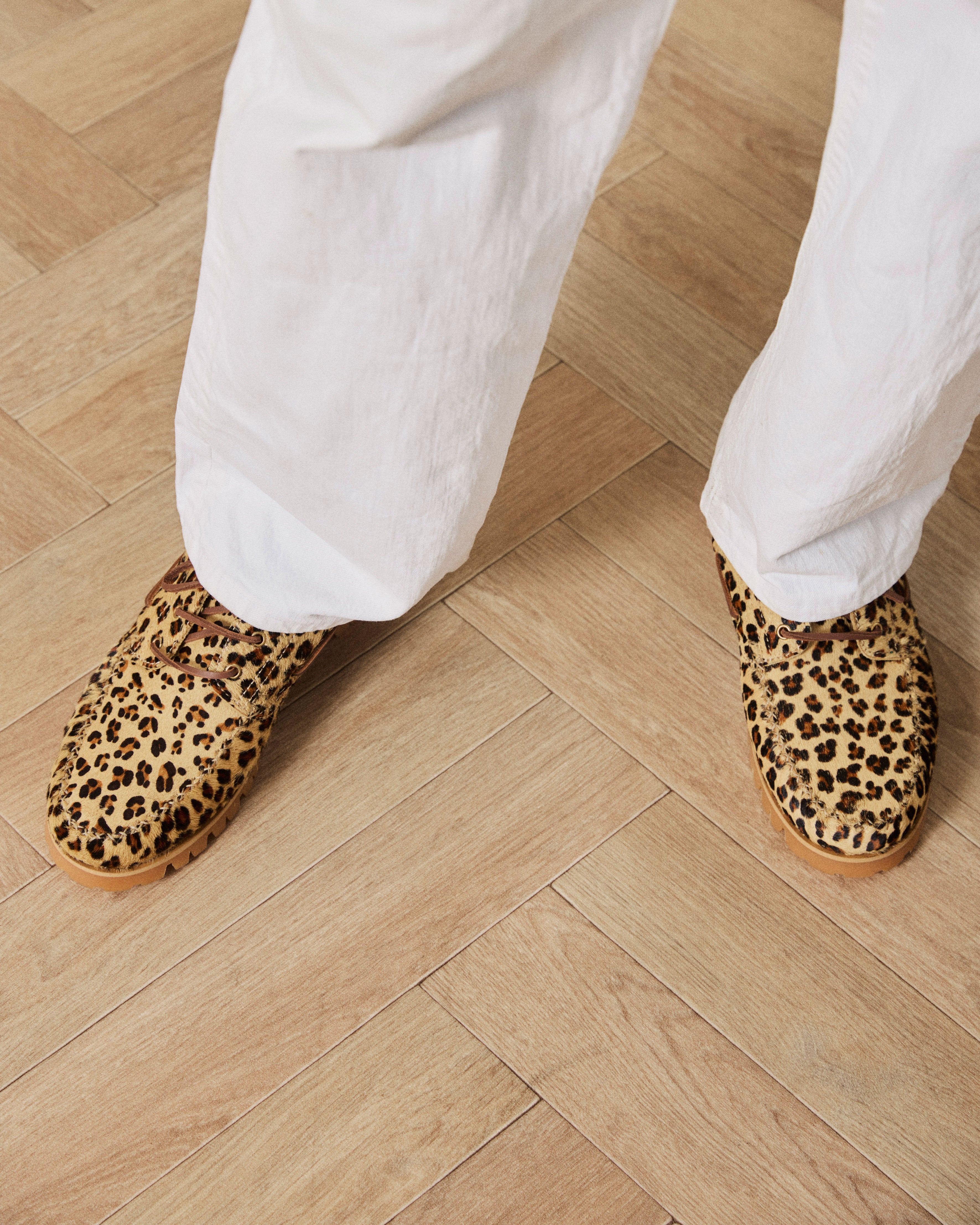 Aztec shoe with leo on model close up
