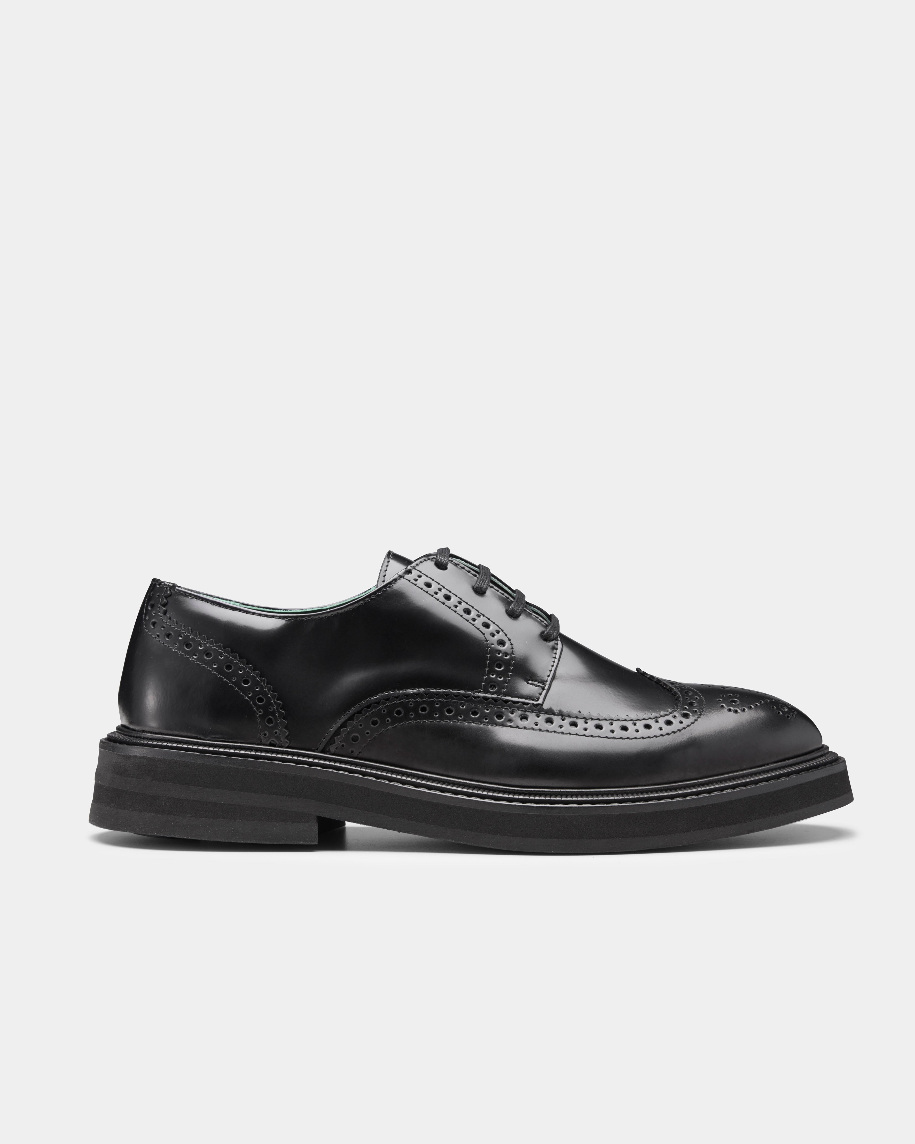 officer brogue in black from the side