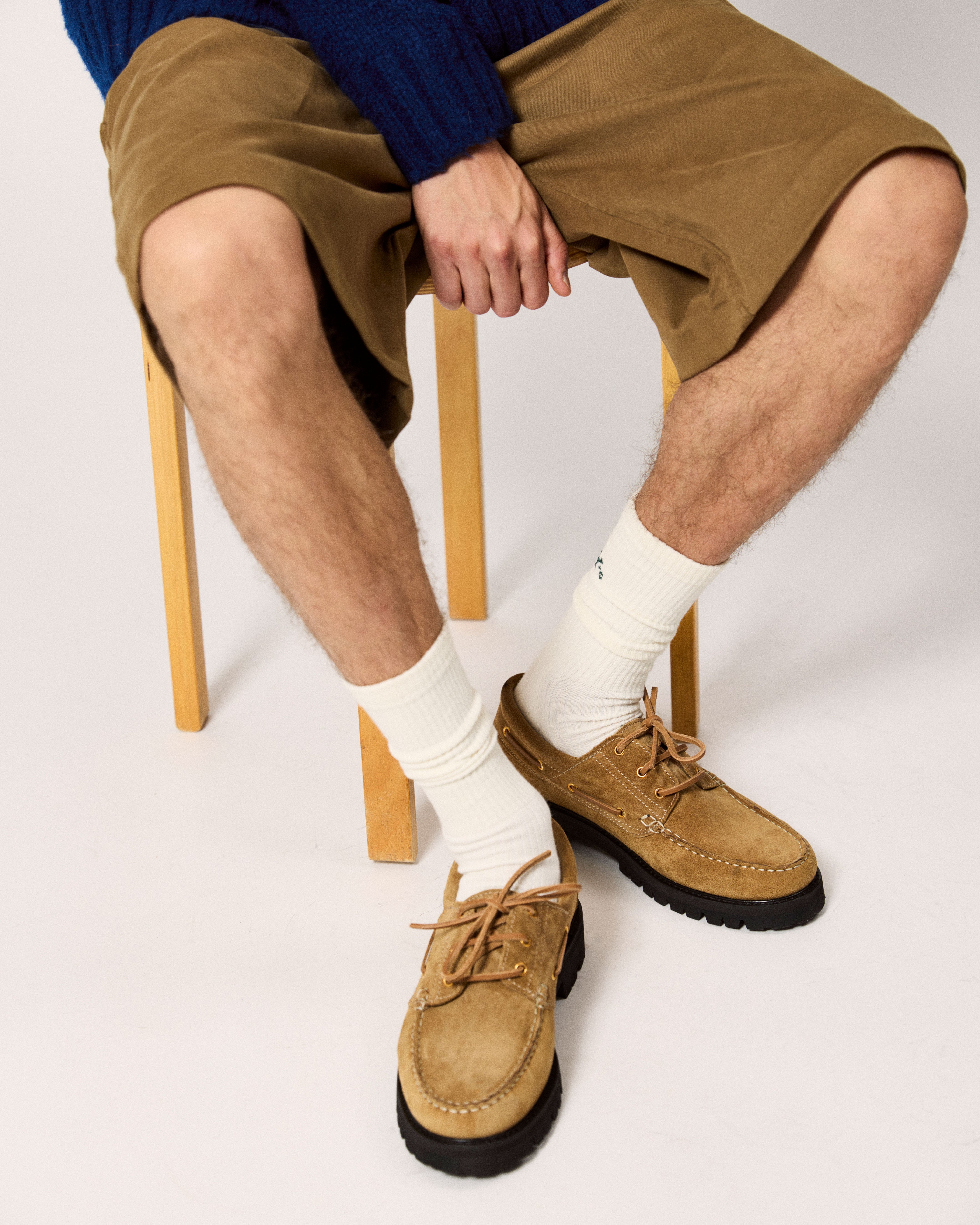 men's boat shoe in sand on model