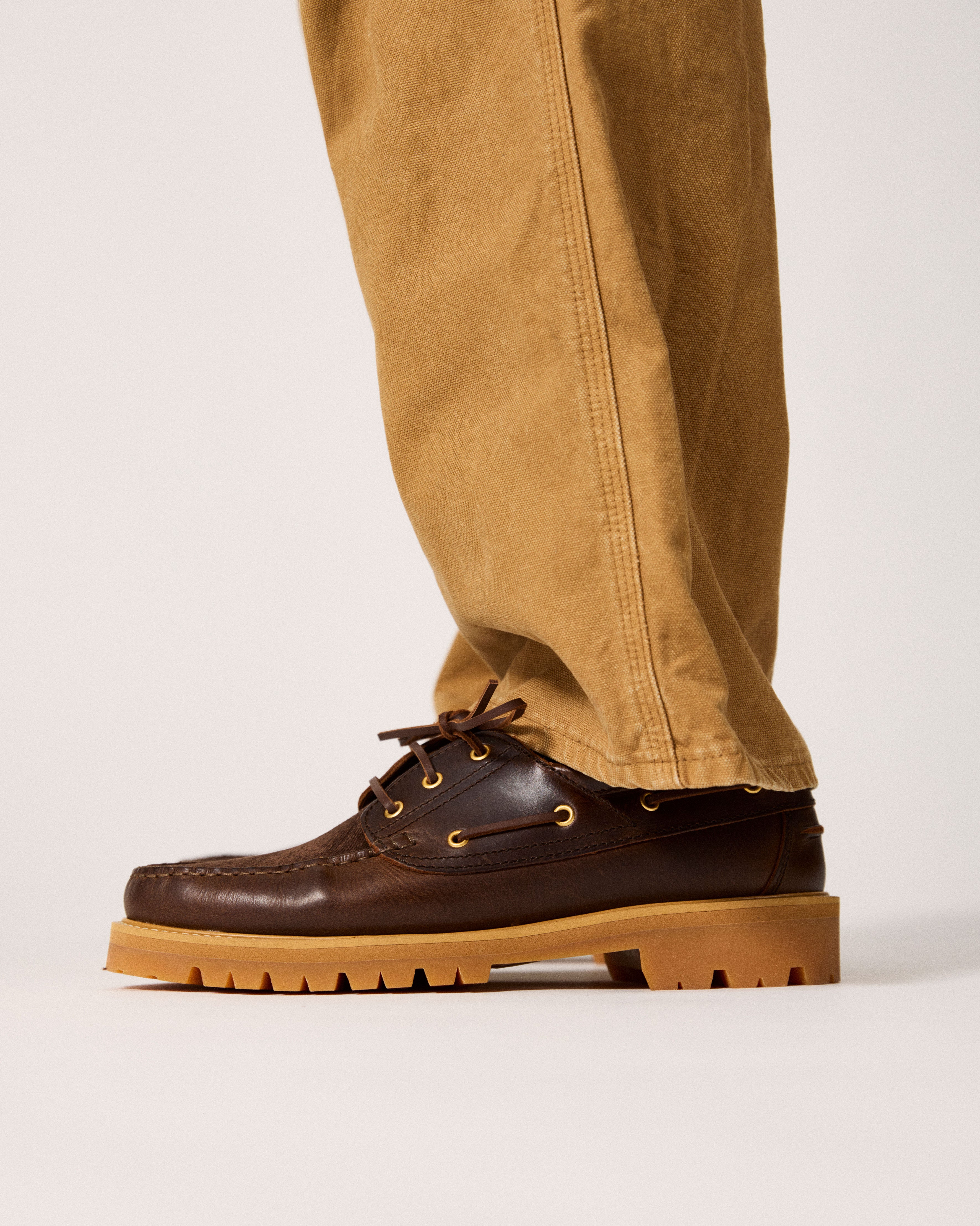 men's boat shoe in brown on model